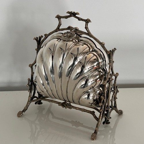 9 - A Victorian Silver Plated Clam Shell Muffin Warmer. Walker & Hall, Sheffield. 24.5cm high.