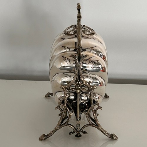 9 - A Victorian Silver Plated Clam Shell Muffin Warmer. Walker & Hall, Sheffield. 24.5cm high.