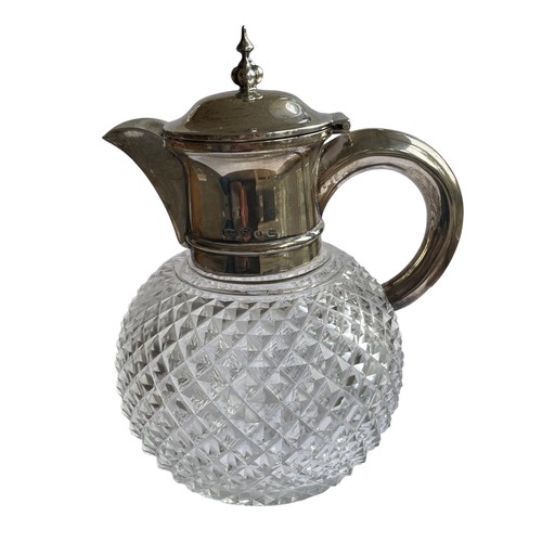 6 - A Victorian globular cut glass and silver mounted claret jug, Birmingham 1890 by Hilliard & Thomason