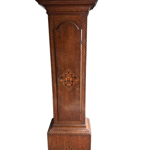 18 - An Oak Cased long case clock, arched brass dial with silvered chapter, subsidiary seconds and date a... 