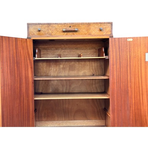 227 - Waring & Gillows Walnut Bedroom Suite comprising wardrobe, tall boy with two draws over four selves,... 