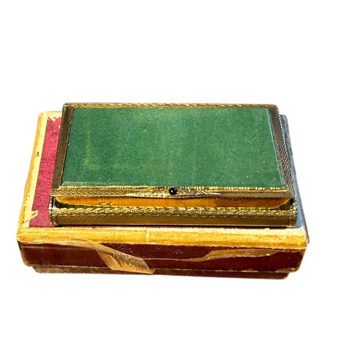 50 - A Hallmarked Silver Box, London 1927, probably a snuff box, allover engine turned design, gilt to in... 