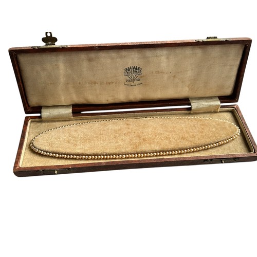 14 - A Musical Jewellery Box containing a collection of Costume / Dress Jewellery