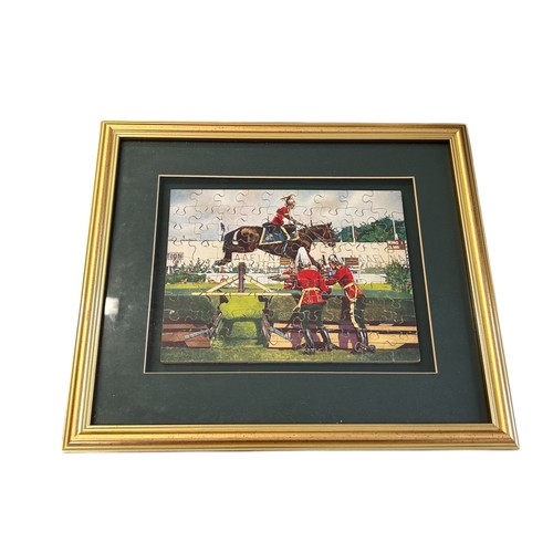 136 - Military Interest - A Framed Military Jigsaw Puzzle showing Sergeant East and his horse Victory at t... 