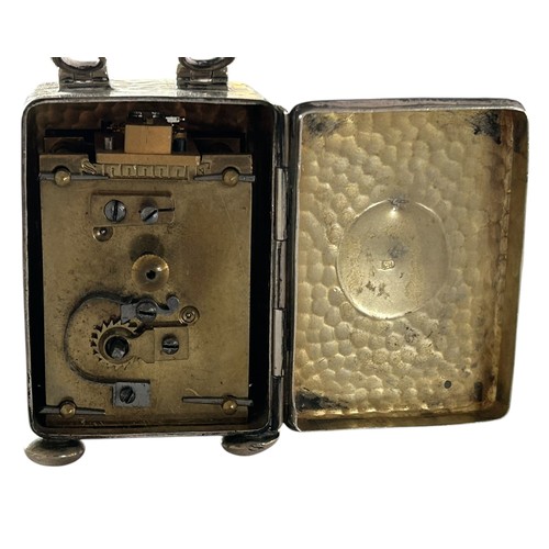 115 - A Small Hallmarked Silver Carriage Clock, eight day French movement in a beaten silver case, by Elki... 