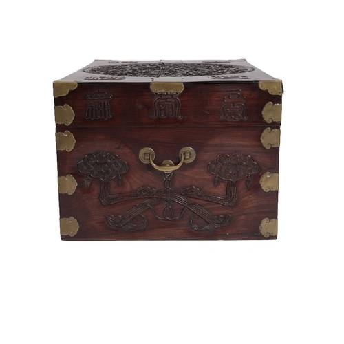 4 - CARVED HUANGHUALI 'TREASURE' BOX, QING DYNASTY the brass bound rectangular box finely carved with fi... 