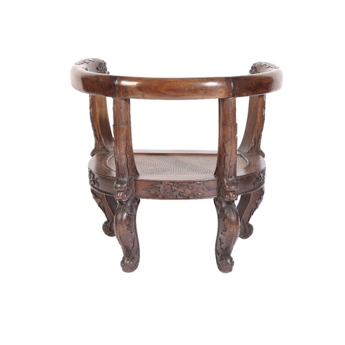 6 - RARE HUANGHUALI LOW ARMCHAIR, 17TH / 18TH CENTURY the horseshoe-shaped back with ornate dragon mask ... 