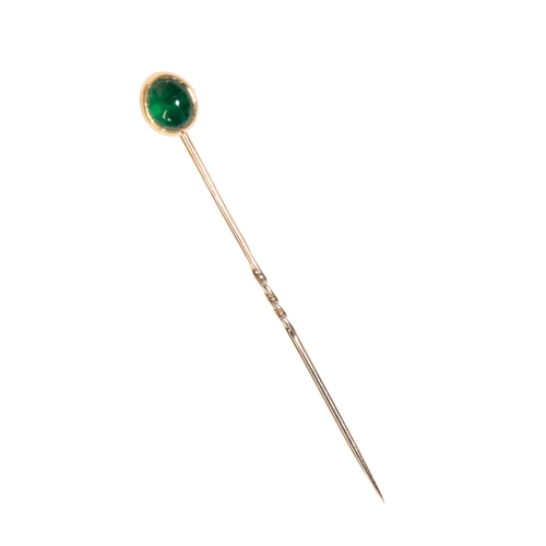 190 - A CABOCHON EMERALD STICK PIN SET IN 18CT YELLOW GOLD on an 18ct yellow gold barley twist pin fitting... 