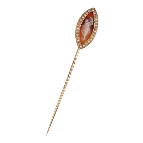 194 - A CAMEO STICK PIN the cameo of a maiden playing the tambourine, surrounded by a border of seed pearl... 