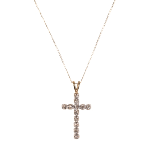 208 - A DIAMOND SET CROSS PENDANT on a 10ct gold trace chain. Estimated total diamond weight: 0.18cts. Ass... 