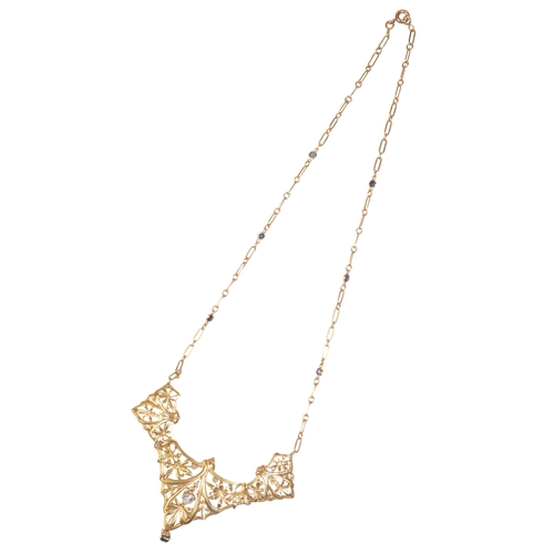 228 - AN ART NOUVEAU DIAMOND SET GOLD OPENWORK NECKLACE with an integrated chain set with spectacle set ro... 