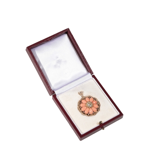 229 - A DIAMOND AND CORAL LOCKET PENDANT the central diamond cluster approx 0.43 ct, within a border of co... 