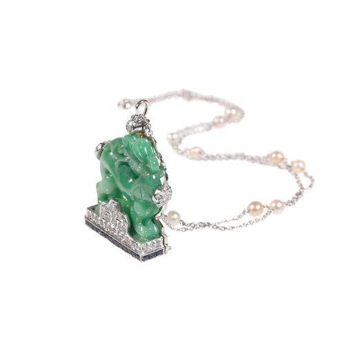 231 - A FINE CARVED JADEITE PENDANT, the jadeite carved as a dog standing on a diamond-set and princess-cu... 