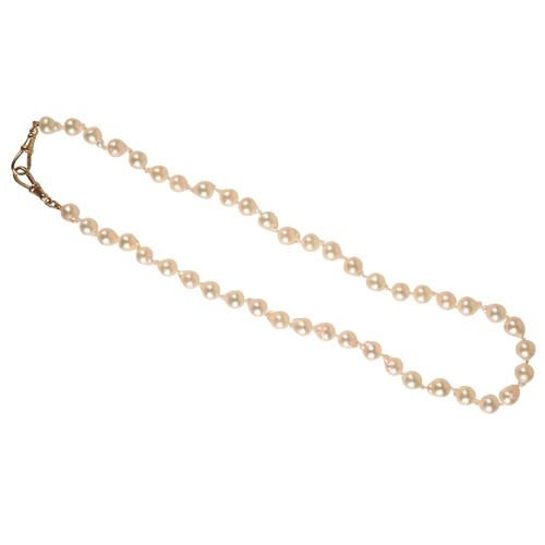 233 - A BAROQUE PEARL NECKLACE a single strand of cultured baroque pearls with a 9ct clasp, 50cm long