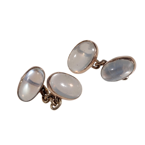 262 - A PAIR OF GENTLEMAN'S MOONSTONE CUFFLINKS each oval-cut moonstone, with unmarked yellow metal chain ... 