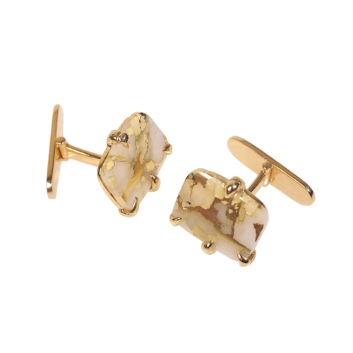 266 - A PAIR OF RECTANGULAR WHITE QUARTZ TABLET CUFFLINKS CONTAINING THICK VEINS OF GOLD the tablets are s... 