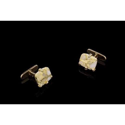 266 - A PAIR OF RECTANGULAR WHITE QUARTZ TABLET CUFFLINKS CONTAINING THICK VEINS OF GOLD the tablets are s... 