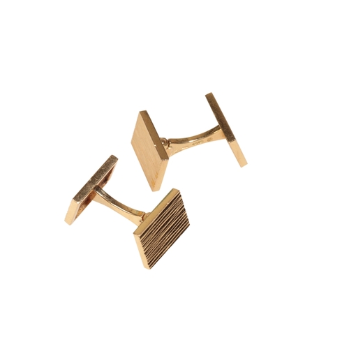 270 - A PAIR OF 1940S VAN CLEEF AND ARPLES TEXTURED 18CT YELLOW GOLD CUFFLINKS the face twists on a sprung... 