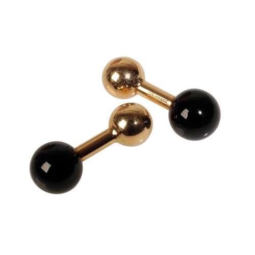 271 - A PAIR OF 1970S TIFFANY AND CO ONYX AND 18CT YELLOW GOLD BARBELL CUFFLINKS With gold ball terminal o... 