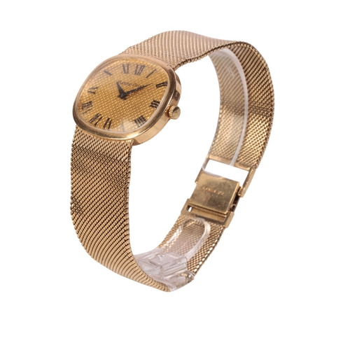 283 - BUECHE-GIROD 9CT GOLD GENTLEMAN'S BRACELET WATCH with manual wind movement, gold oval dial case, wit... 