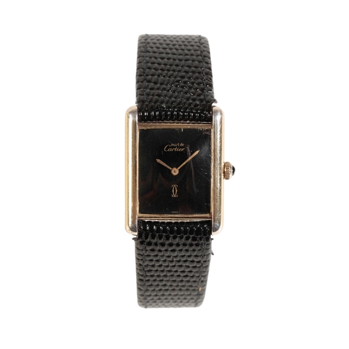 287 - CARTIER LADY'S WRIST WATCH MUST DE CARTIER, silver gilt with manual wind movement, the black dial wi... 