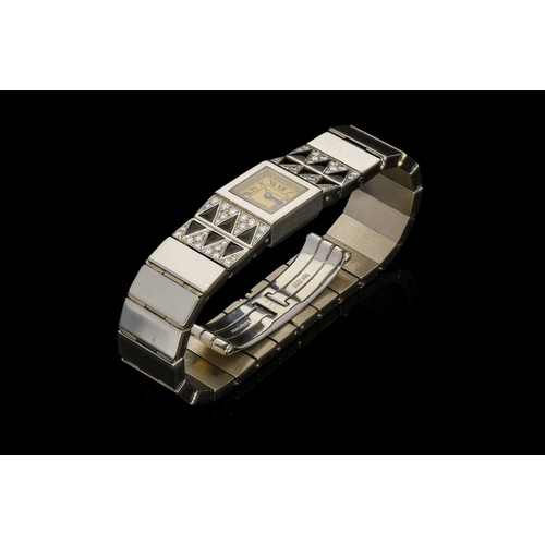 288 - VINTAGE CARTIER DIAMOND AND ONYX 18CT WHITE GOLD LADY'S WATCH with a faded square face displaying ro... 