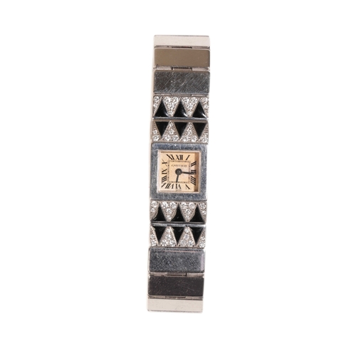 288 - VINTAGE CARTIER DIAMOND AND ONYX 18CT WHITE GOLD LADY'S WATCH with a faded square face displaying ro... 