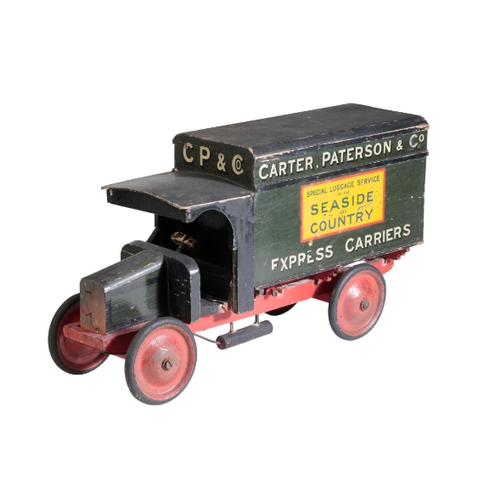 217 - A 1930'S WOODEN TOY TRUCK painted with the colours of 'Carter, Paterson & Co Special Luggage Service... 