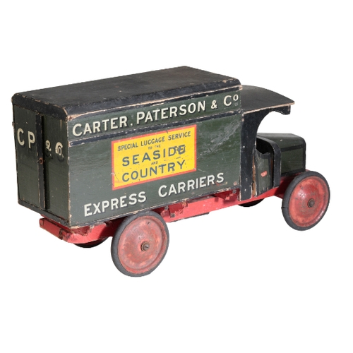 217 - A 1930'S WOODEN TOY TRUCK painted with the colours of 'Carter, Paterson & Co Special Luggage Service... 