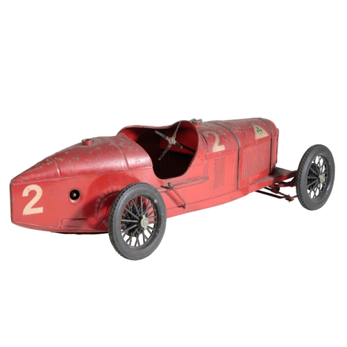 218 - A 1930'S TINPLATE MODEL OF THE ALFA ROMEO P2 red with finely painted stencils, 52cm long. Provenance... 