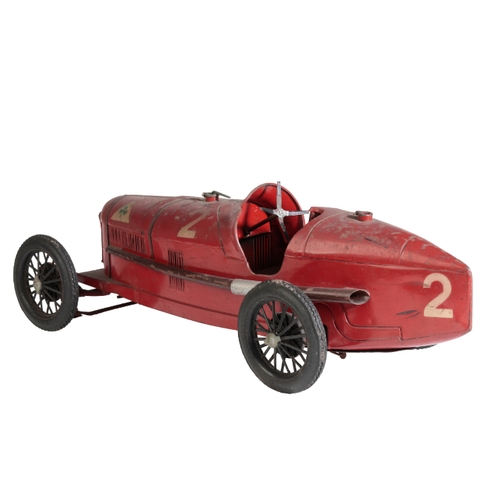 218 - A 1930'S TINPLATE MODEL OF THE ALFA ROMEO P2 red with finely painted stencils, 52cm long. Provenance... 