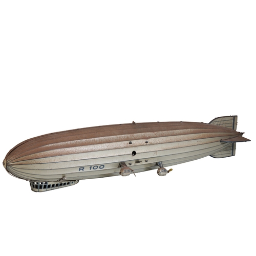 219 - A 1930'S GERMAN TINPLATE CLOCKWORK AIRSHIP possibly Tippco, with opening forward gondola, stencilled... 