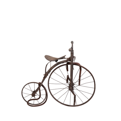 223 - A CHILDS PENNY FARTHING BICYCLE measuring 75cm high. Provenance: The Estate of the Late Rufus Eyre