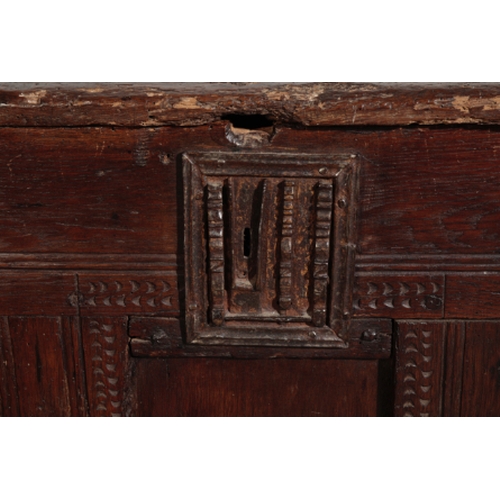 901 - AN OAK COFFER,, elements probably 16th century and later, with shallow arched cover, the front with ... 