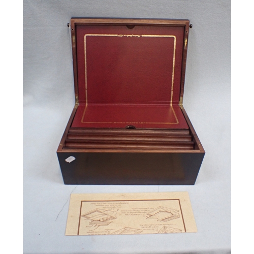 11 - A REMY MARTIN COGNAC WRITING SLOPE with compartments for bottles, and descriptive leaflet
