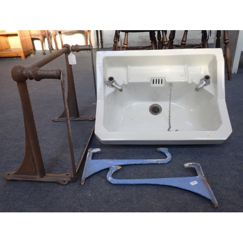 3 - A VINTAGE ART DECO BATHROOM WASHBASIN with iron brackets, and set of a cast iron support brackets fo... 
