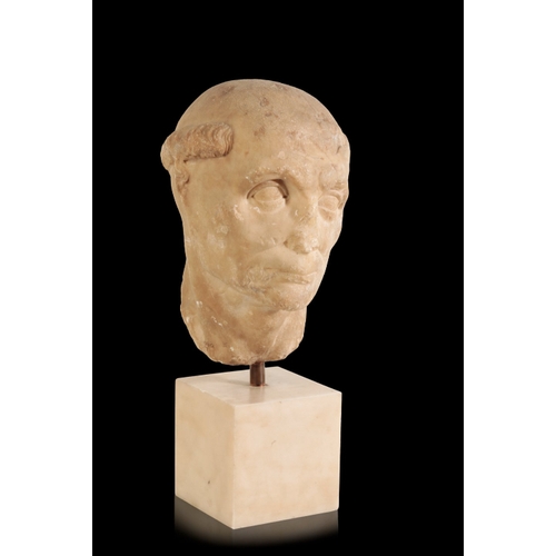 100 - A MARBLE HEAD OF A MONK probably Roman Republic, 1st century, later carved in the medieval period, t... 