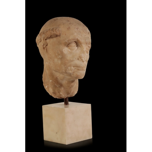 100 - A MARBLE HEAD OF A MONK probably Roman Republic, 1st century, later carved in the medieval period, t... 