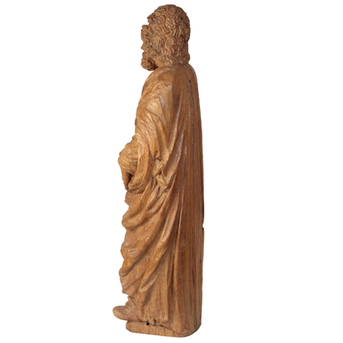 102 - A FRENCH OAK FIGURE OF ST. MARK, circa 1580 standing holding the Bible, a lion at his feet, 88cm hig... 