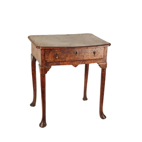 130 - A GEORGE II SOLID BURR-ELM SIDE TABLE second quarter of the 18th century, the rectangular top with r... 