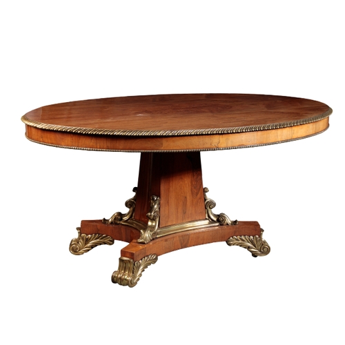 163 - A GEORGE IV ROSEWOOD AND GILT-METAL-MOUNTED CENTRE TABLE, second quarter 19th century, the hinged ti... 