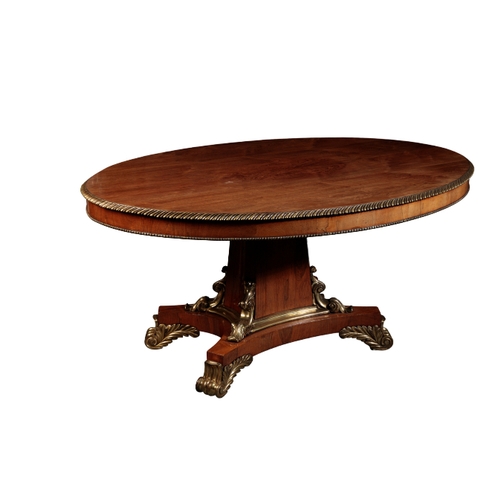 163 - A GEORGE IV ROSEWOOD AND GILT-METAL-MOUNTED CENTRE TABLE, second quarter 19th century, the hinged ti... 