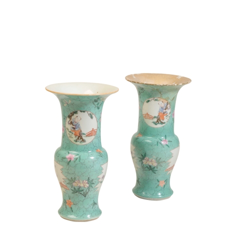 34 - A PAIR OF FAMILLE ROSE AND FAUX-TURQUOISE VASES, QIANLONG / JIAQING PERIOD the baluster sides finely... 