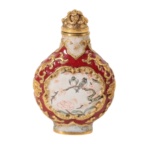 74 - A FINE CHINESE ENAMEL SNUFF BOTTLE decorated with panels of birds and flowers, the base with a four ... 