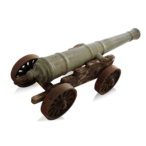 83 - A RARE CHINESE BRONZE CANNON, QIANLONG, DATED 1789 with a well patinated surface, the cannon bears i... 