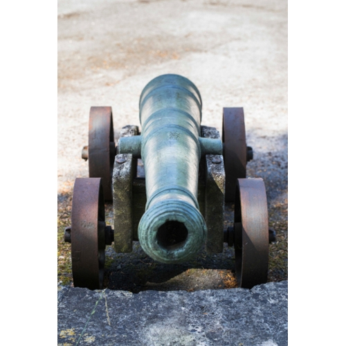 83 - A RARE CHINESE BRONZE CANNON, QIANLONG, DATED 1789 with a well patinated surface, the cannon bears i... 
