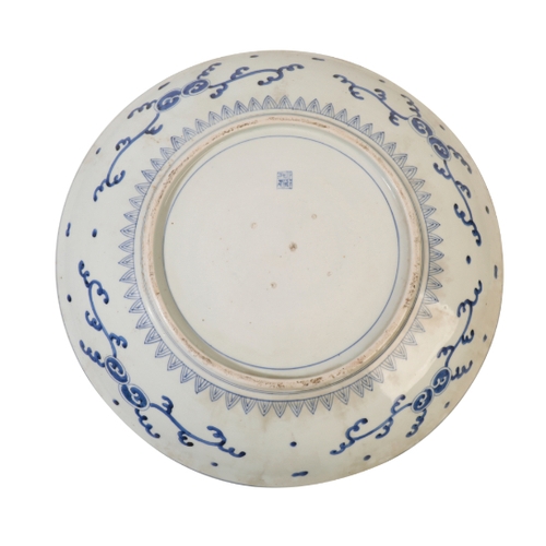 92 - A JAPANESE PORCELAIN CHARGER decorated in polychrome enamel underglaze blue and gilt with European m... 