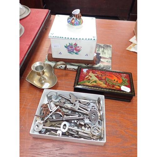 27 - POOLE POTTERY HONEY BOX with a Russian lacquer box, a box of keys, a brass chamber stick and two boo... 