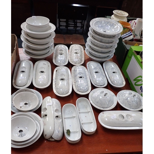 28 - A COLLECTION OF VICTORIAN SOAP DISHES AND TOOTHBRUSH BOXES many with a marbled finish, all with desi... 