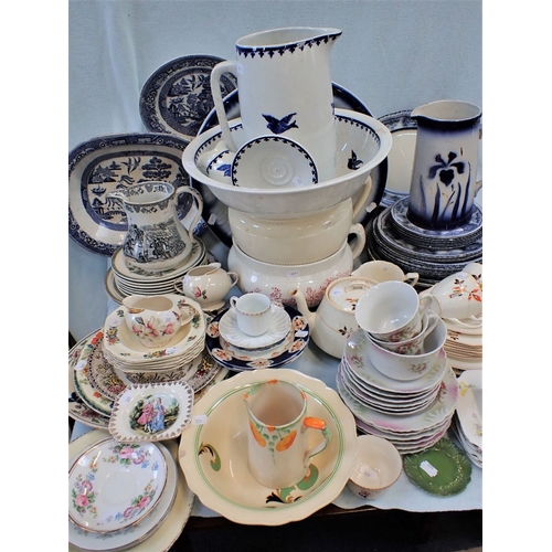 33 - AN EDWARDIAN SPONGEWARE  TOILET SET (the bowl glaze damaged) a Crimean war transfer printed jug (cra... 